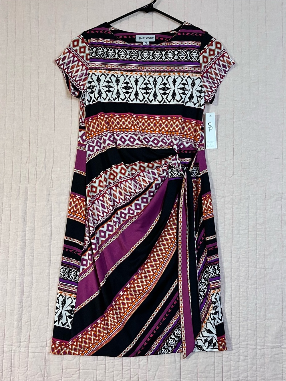NWT Shelby & Palmer Purple, Black, Orange & White Aztec Print Dress. Faux wrap,